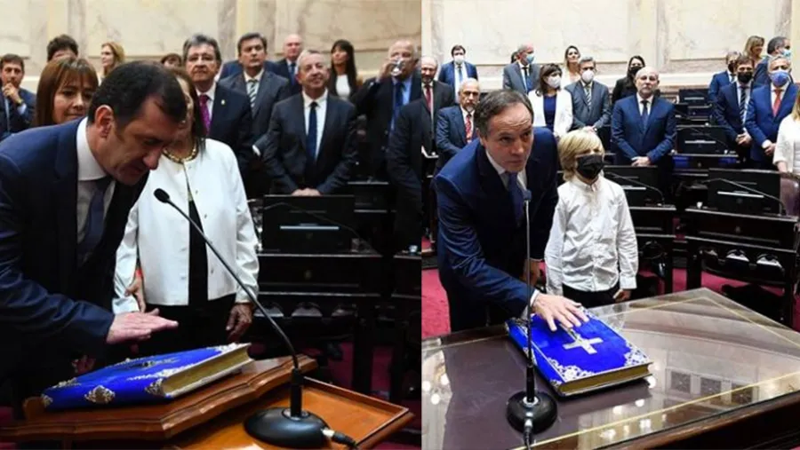 Los senadores Edgardo Kueider y Carlos Espínola al prestar juramento por los Santos Evangelios.