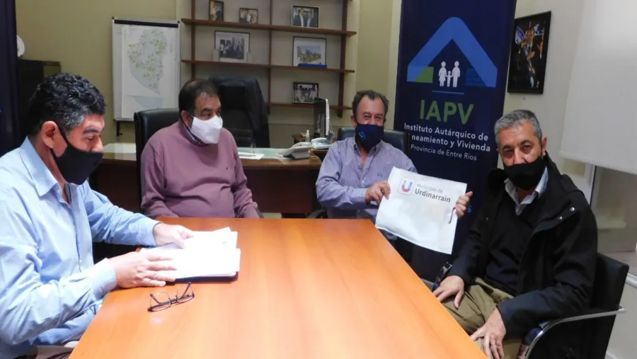 Martínez con Bisogni