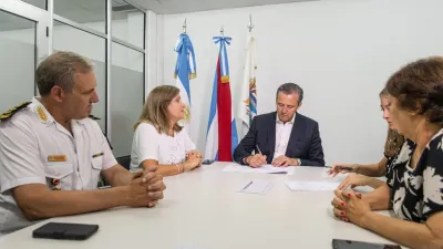 Bahl, Romero, Maslein firman convenio