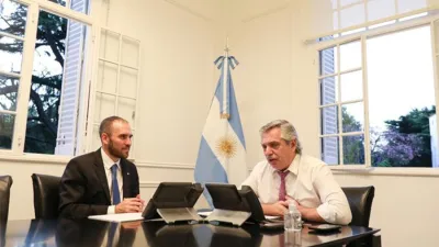 Fotografía de archivo del ministro de Economía, Martín Guzmán y del Presidente Alberto Fernández.