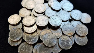 monedas de cinco pesos