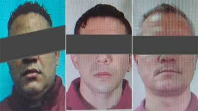 Los tres policías acusados por el crimen.