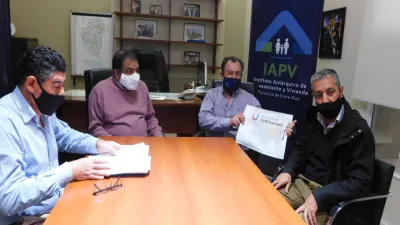 Martínez con Bisogni