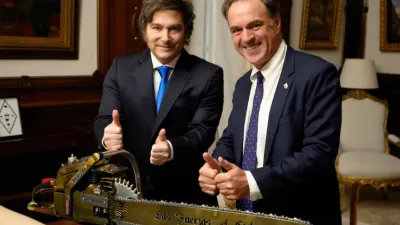 El presidente junto al historiador Niall Ferguson.