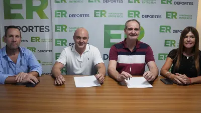 Firma entre Deportes y Salud