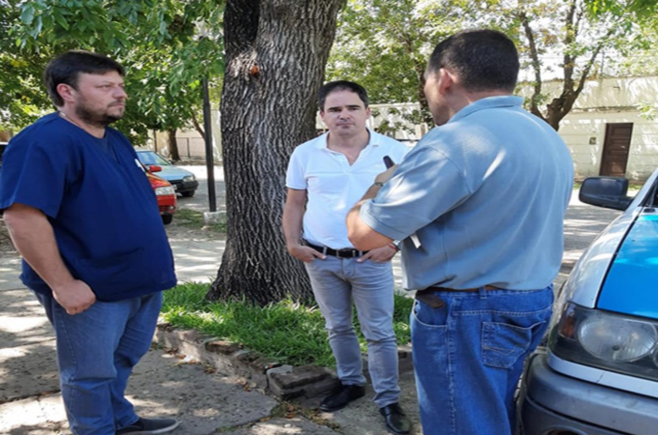 Leonardo Hassel con comisario Ernesto Frabricius