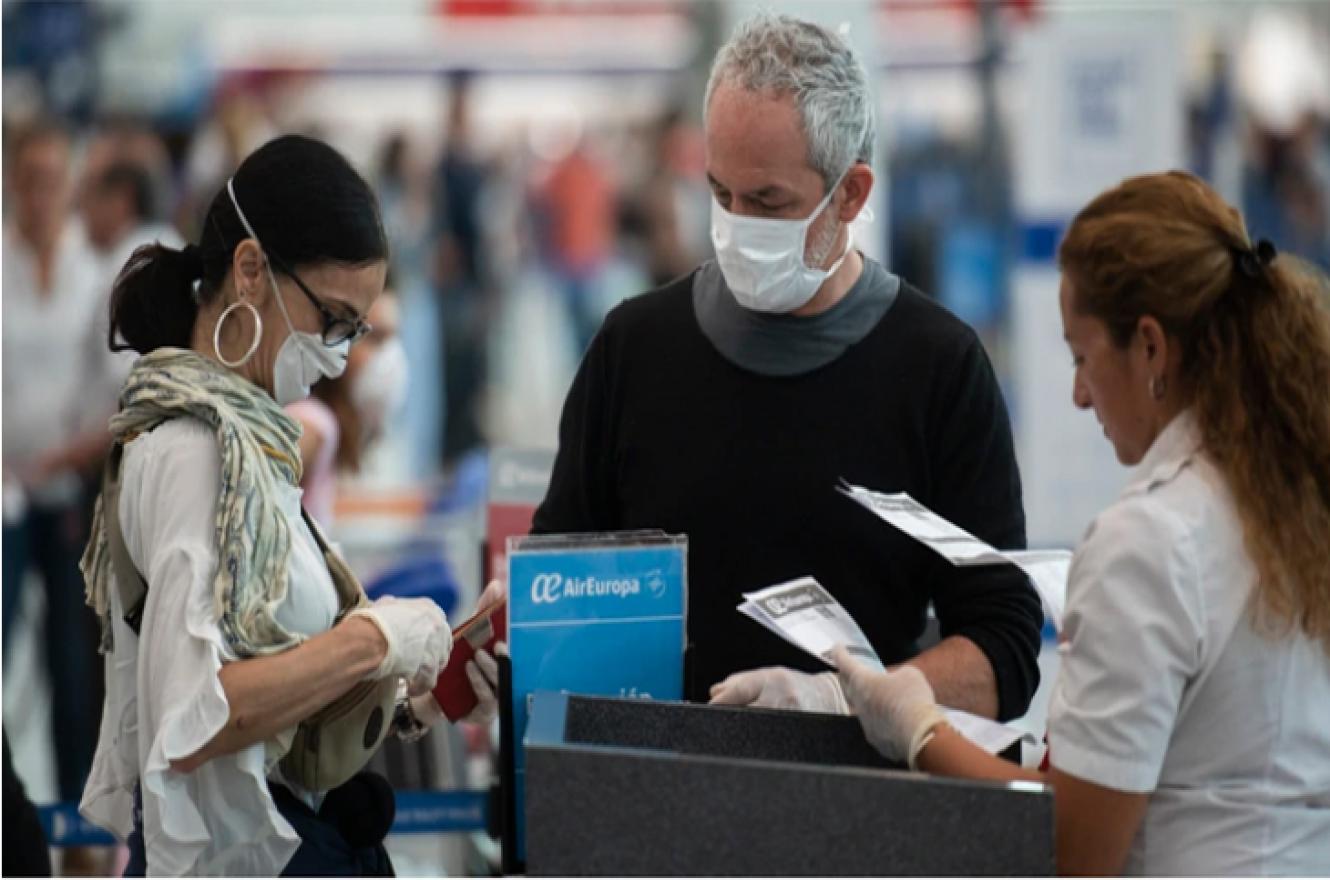 coronavirus barbijos aeropuerto