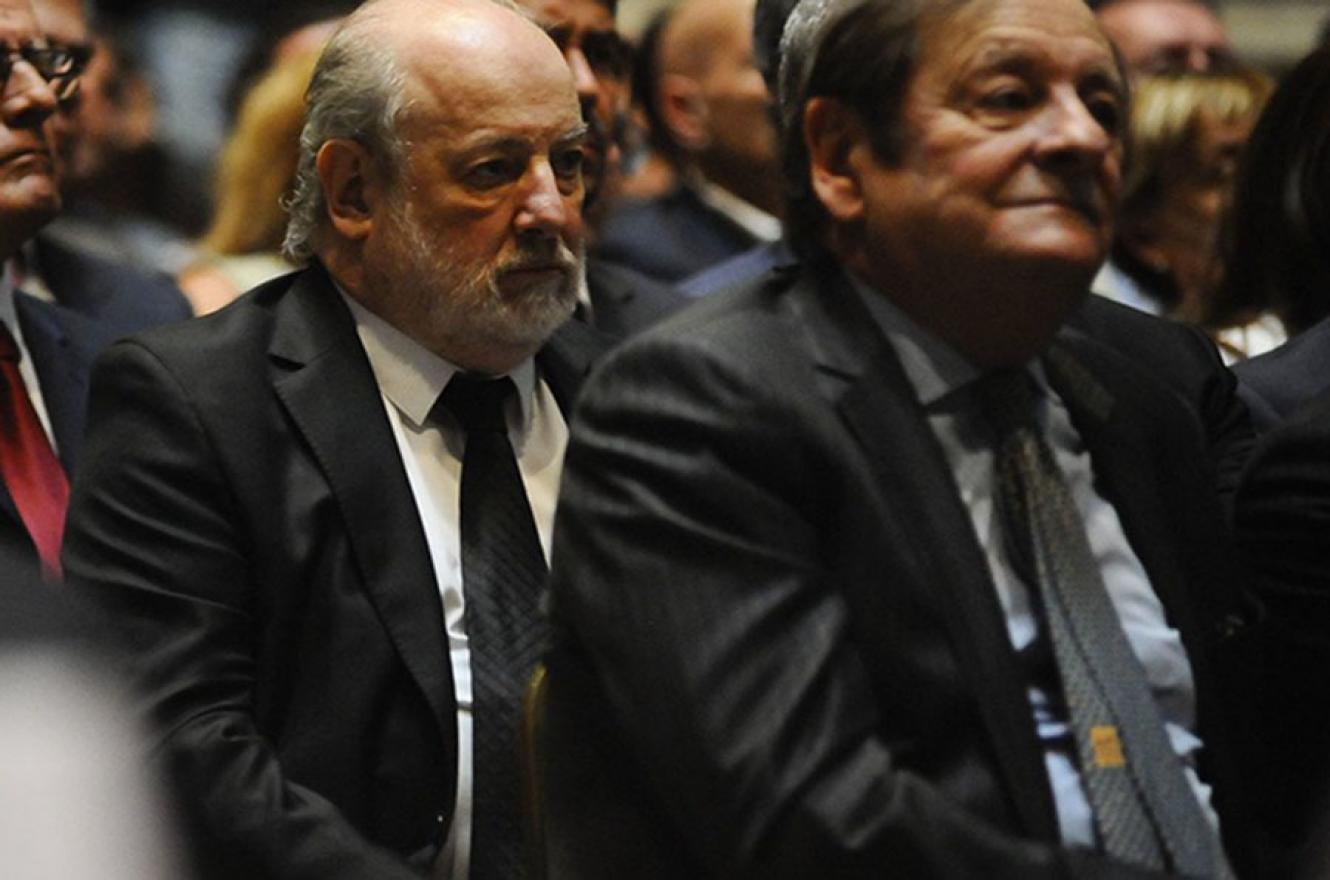 El juez Claudio Bonadio y su colega Rodolfo Canicoba Corral escuchan uno de los discursos de apertura del año judicial.