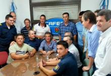 Imagen de archivo del acuerdo entre los policías sediciones y el entonces gobernador Sergio Urribarri.